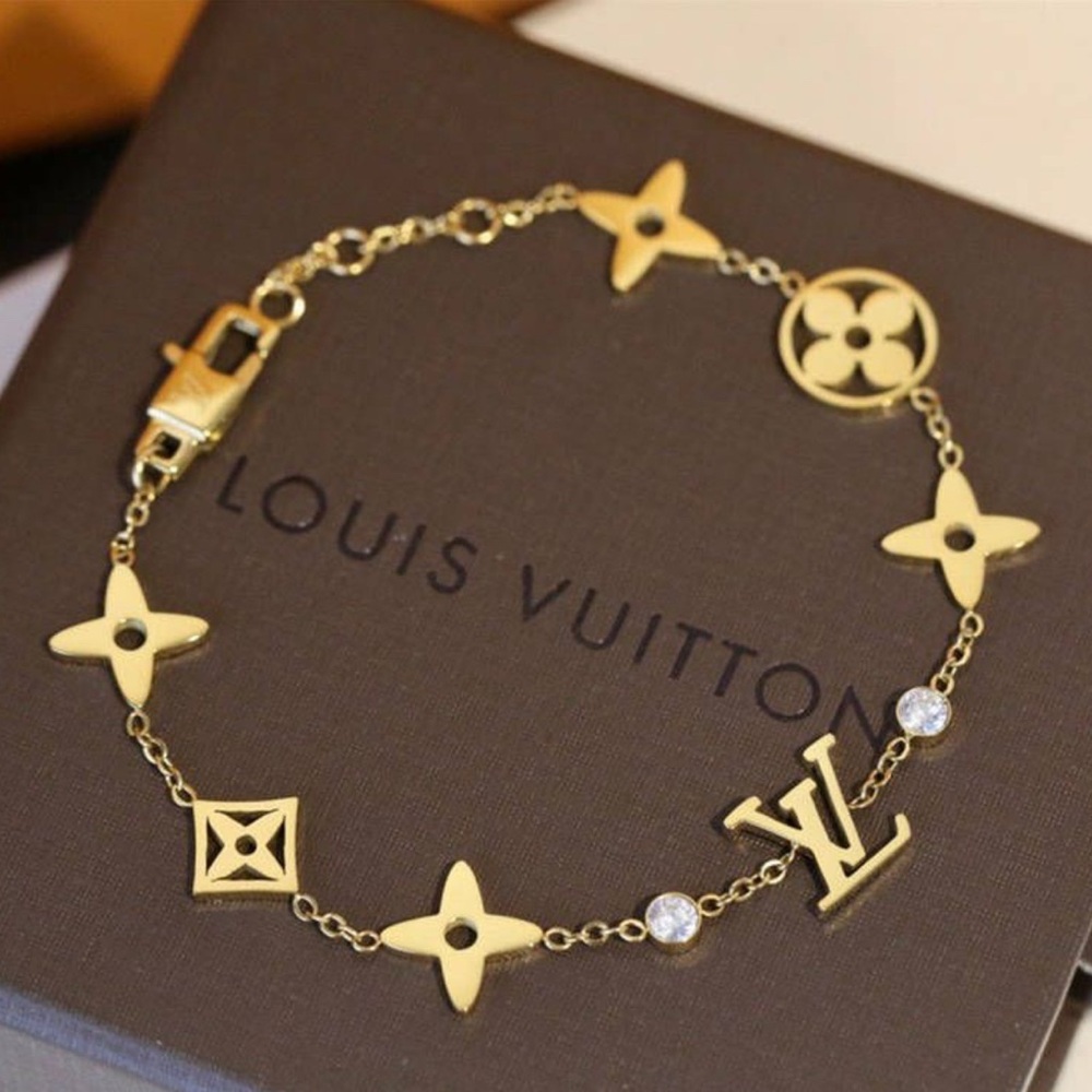 Gorgeous Yellow Gold Louis Vuitton Style Charm Bracelet with Crystal Accent
